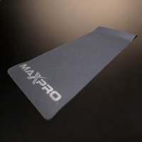 exercise mat with MAXPRO written on it with a black gold background