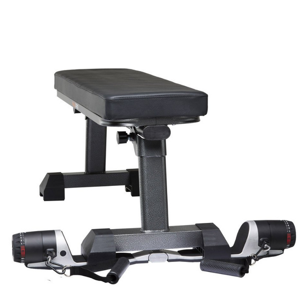 Raw metal maxpro under the maxpro bench with the leg holding the maxpro in place on a white background