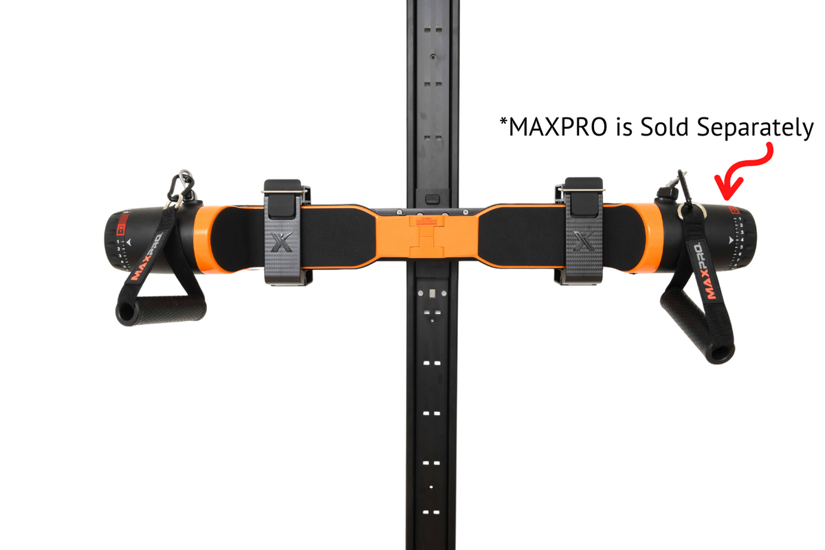 Orange MAXPRO cable trainer with handles mounted horizontally on a black wall track, with a note that MAXPRO is sold separately.